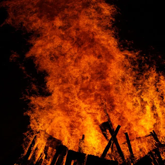 A bonfire blazing at night